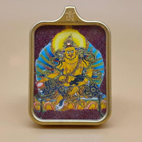 Yellow Dzambhala Amulet | Hand-painted Cinnabar with Gilt Accents