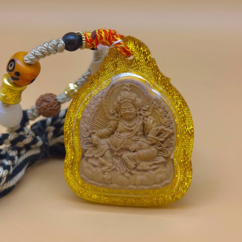 Yellow Jambhala Tsa-Tsa (with consecrated rice grains inside, yellow border)